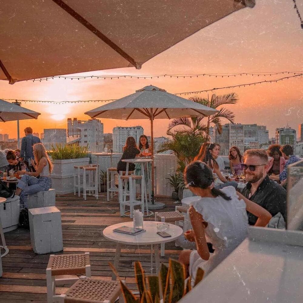 Elegant rooftop restaurant in Ho Chi Minh City serving premium Vietnamese fusion cuisine with panoramic city views